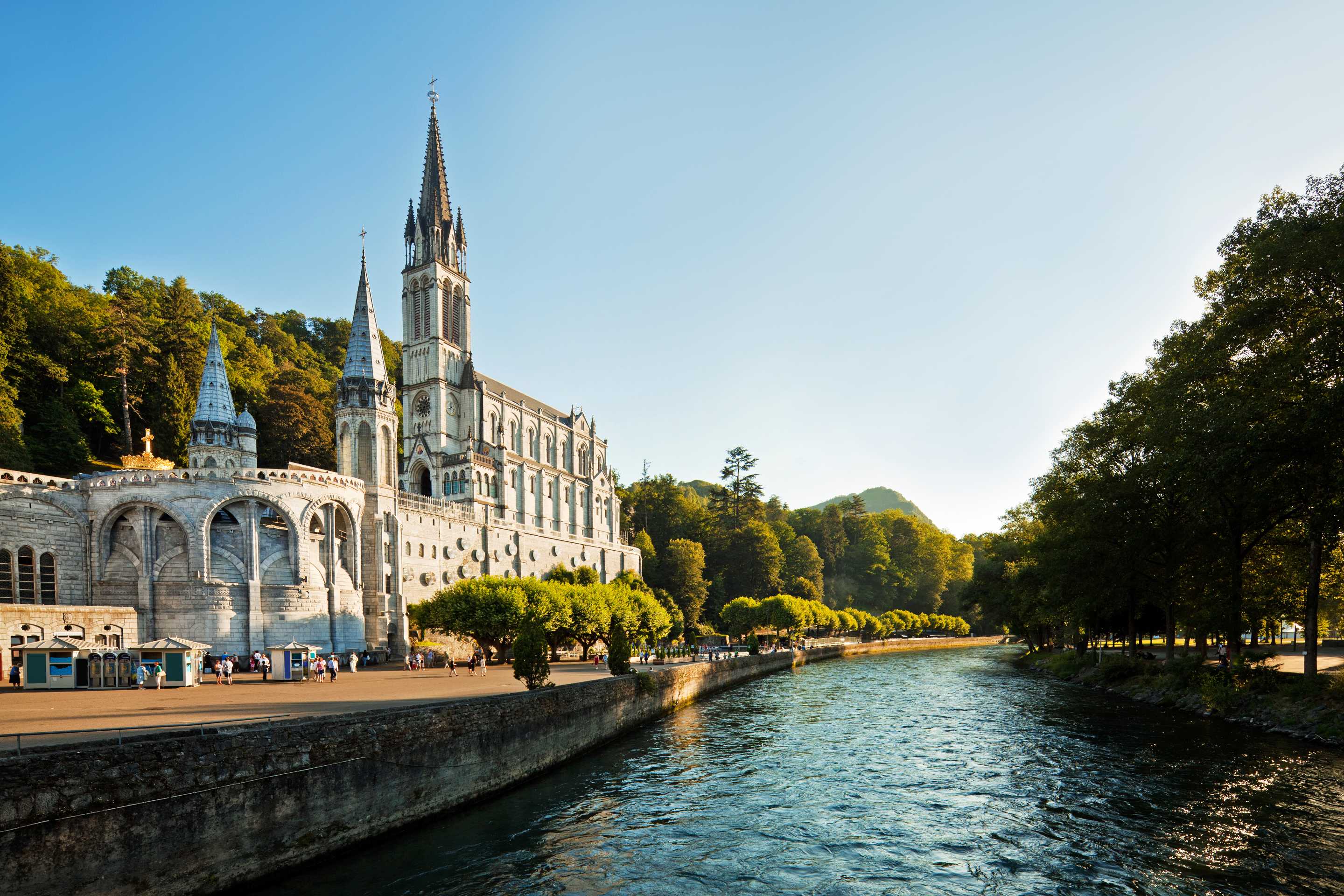 river and basilica in lourdes