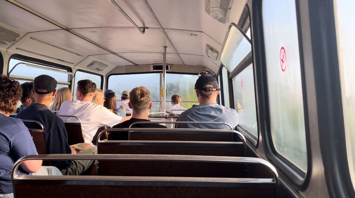 On the shuttle bus to Glastonbury Festival