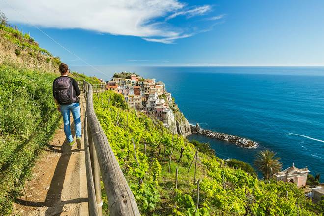 Woman hiking near Manarola Cinque Terre