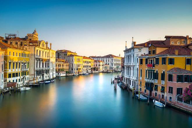 Venice canal with houses either side