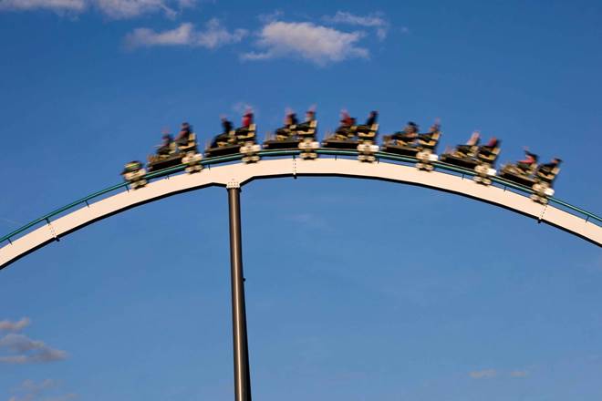 People on a rollercoaster