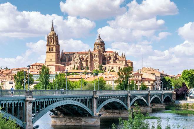 Salamanca with bridge over Tormes river and cathedral