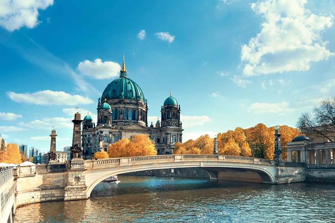 Berlin Cathedral with a bridge over Spree river in Autumn