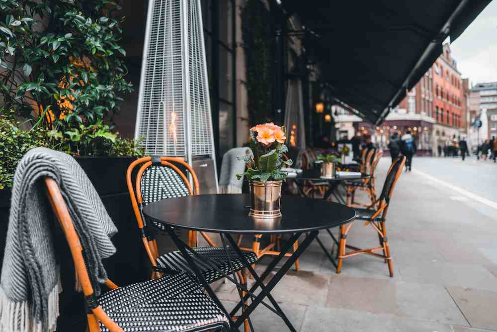 Tables outside restaurant in London, UK