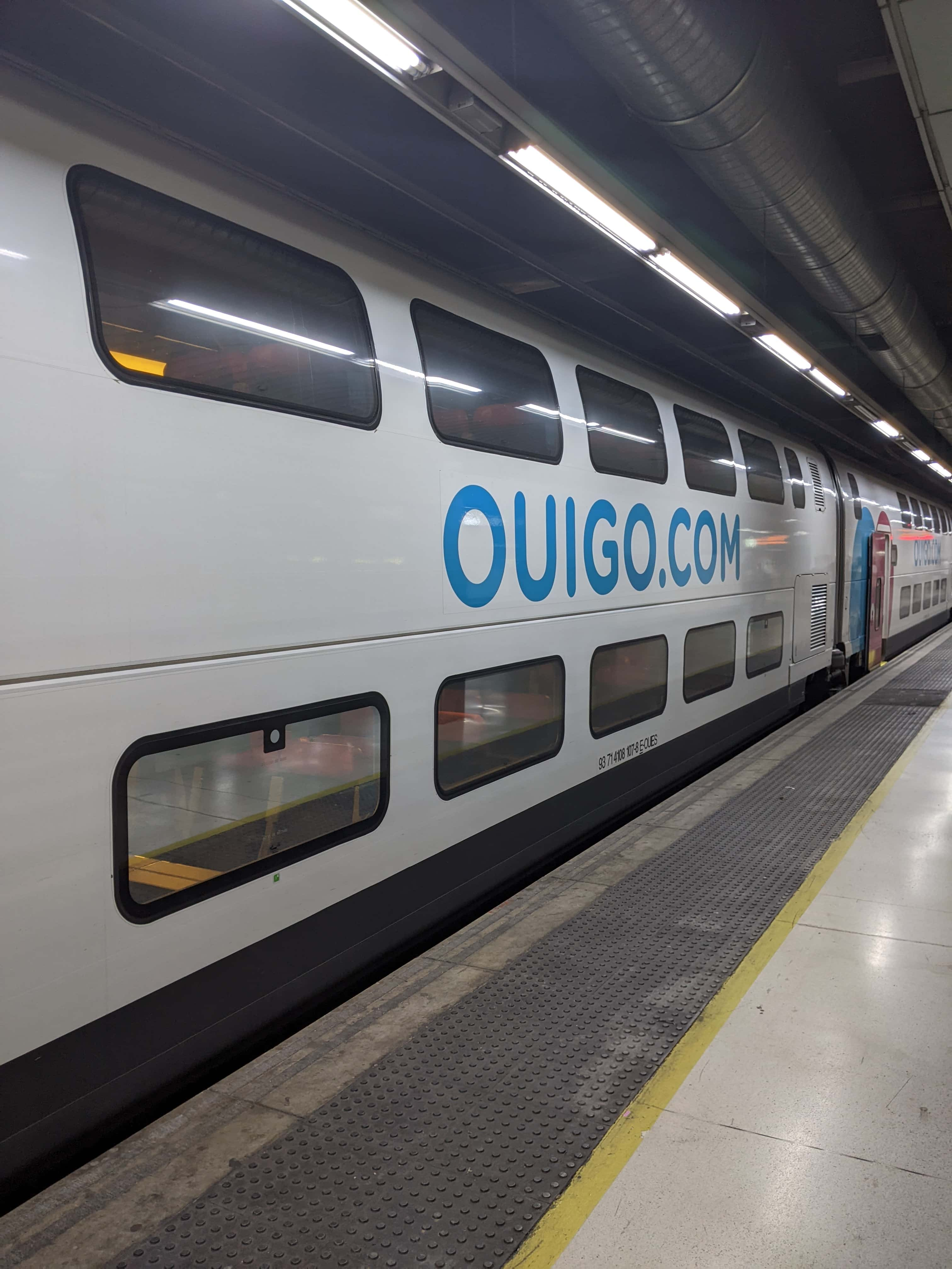 Exterior side view of a OUIGO train